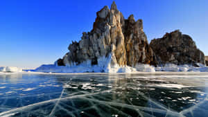 Majestic Rock Formation At Lake Baikal Wallpaper