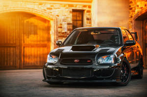 Majestic Subaru In Pitch Black Paint Wallpaper