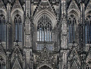 Majestic View Of Cologne Cathedral With Gothic Architecture Wallpaper