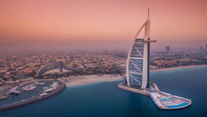 Majestic View Of The Burj Al Arab In All Its Glory Wallpaper