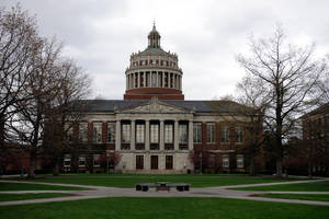 Majestic View Of The University Of Rochester Library Under A Gray Sky Wallpaper