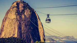 Majestic Vista Of Rio De Janeiro's Sugarloaf Mountain Wallpaper