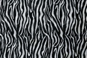 Make Any Ensemble Come Alive With This Bold Black And White Animal Print Wallpaper. Wallpaper