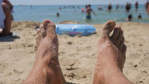 Male Feet On A Beach Wallpaper