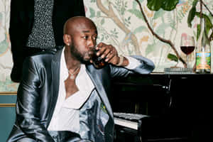 Man Drinkingat Piano Wallpaper