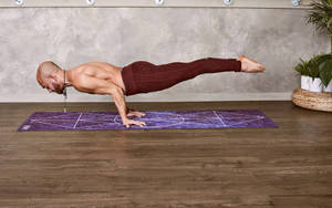 Man Extreme Yoga Pose Wallpaper