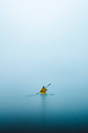 Man On A Row Boat Wallpaper