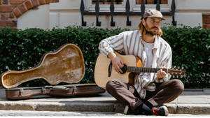 Man Playing Acoustic Guitar Wallpaper