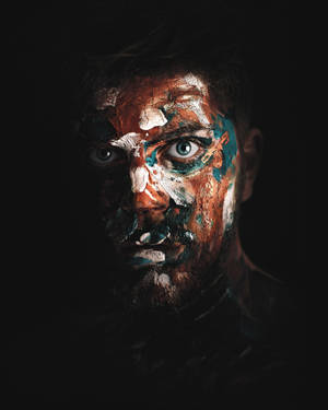 Man's Face Covered In Paint Wallpaper