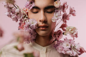 Man's Face With Pink Flowers Aesthetic Wallpaper