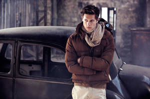 Man Standing On A Vintage Car Wallpaper