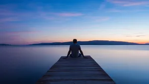 Man Waiting For The Sun To Come Out Wallpaper