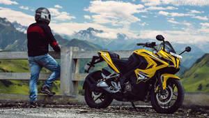 Man With Yellow Pulsar Rs200 Wallpaper