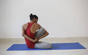 Man Yoga In Blue Mat Wallpaper