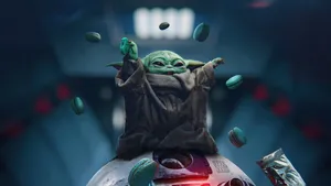 Mandalorian Yoda Eating Green Burgers Wallpaper