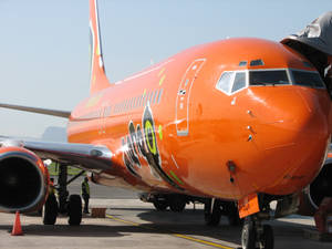 Mango Airlines Orange Airplane Wallpaper