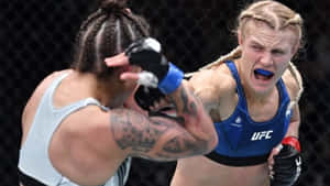 Manon Fiorot Punching Opponent Wallpaper