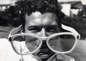 Manwith Oversized Sunglasses Wallpaper