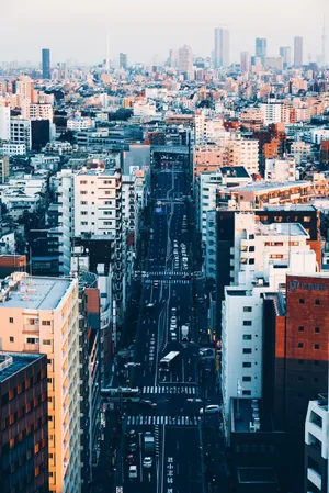 Many Fashionable Young People Gather At The Iconic Harajuku District In Tokyo Wallpaper
