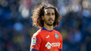 Marc Cucurella Immersed In Sunlight On The Field Wallpaper