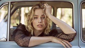 Margot Robbie On Car Window Wallpaper