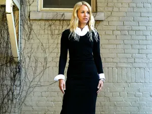 Maria Bello On White Brick Wall Wallpaper