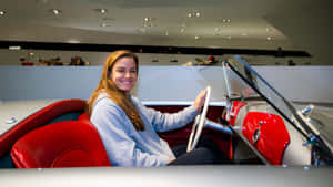 Maria Sakkari Driving A Convertible Wallpaper