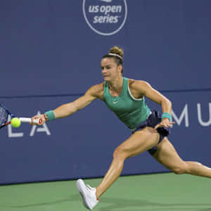 Maria Sakkari Taking A Leap Wallpaper