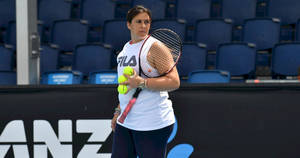 Marion Bartoli Holding Tennis Balls Wallpaper