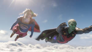 Martian Manhunter And Supergirl Flying Wallpaper