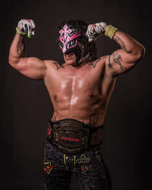 Masked Wrestlerwith Championship Belt Wallpaper