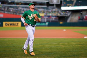 Matt Chapman Running In Baseball Field Wallpaper