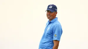 Matt Kuchar In Action During A Professional Golf Tournament Wallpaper