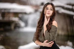 Mature Woman In Winter Background Wallpaper