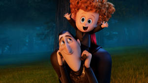 Mavis And Johnny's Fun Piggyback Adventure In Hotel Transylvania 2 Wallpaper