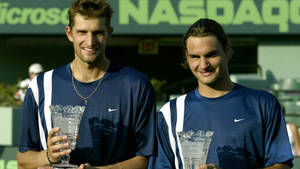 Max Mirnyi And Roger Federer Posing Wallpaper