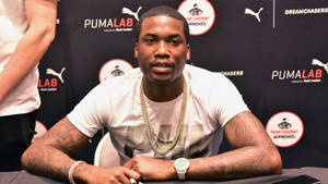 Meek Mill Pumalab Event Wallpaper