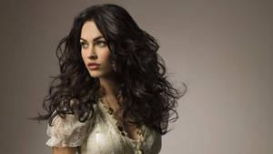 Megan Fox With Her Curly Black Hair Wallpaper