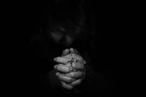 Melancholy Hands Holding Rosary Wallpaper