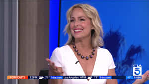 Melora Hardin Smiling During Interview Wallpaper