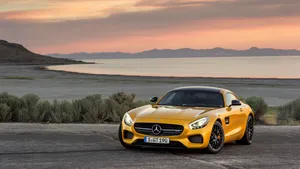 Mercedes Amg 4k Yellow Car Beach View Wallpaper