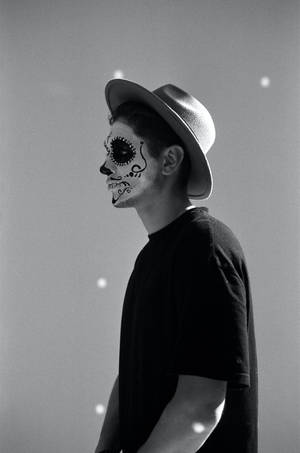 Mexican Man Sideview With Hat Wallpaper