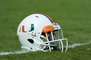 Miami Hurricanes Helmet On Field Wallpaper