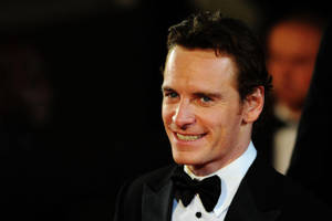 Michael Fassbender Grinning Wallpaper