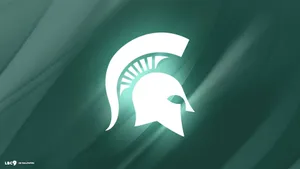 Michigan State Spartans Logo On A Green Background Wallpaper