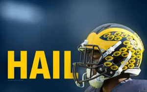 Michigan Wolverines Football Player In Helmet Wallpaper