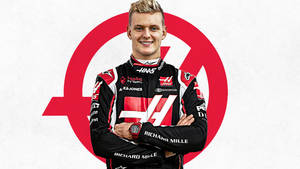 Mick Schumacher Arms Crossed Portrait Wallpaper