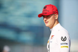 Mick Schumacher In Red Cap Wallpaper