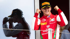 Mick Schumacher Raised Fists Wallpaper