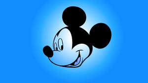 Mickey Mouse In His Glowing Blue Finery Wallpaper